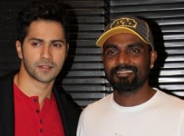 Mumbai: Actor Varun Dhawan and choreographer  Remo D'Souza during the launch of the song 'Chunar' of the film ABCD 2 in Mumbai, on June 8, 2015. (Photo: IANS)