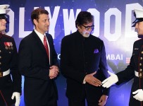 Mumbai: US Consulate General, Thomas Vajda and Bollywood superstar, Amitabh Bachchan being greeted by US Marines during the the 239th anniversary of US Independence in Mumbai on Thursday.